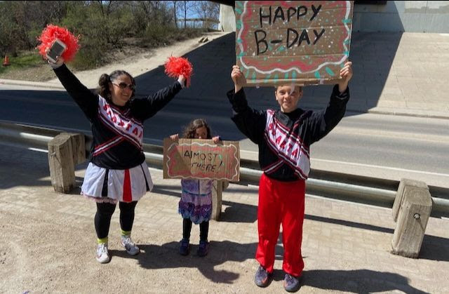 Friends and family cheer on Jackie Kivol.