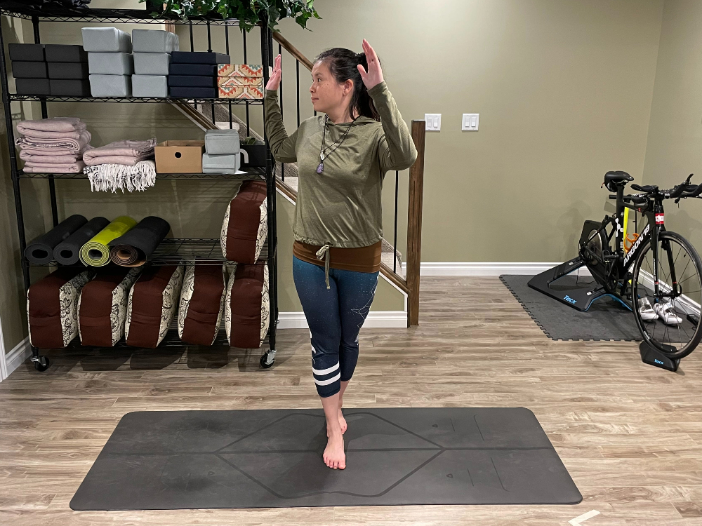 Jackie Lai demonstrates the Egyptian Balance pose.