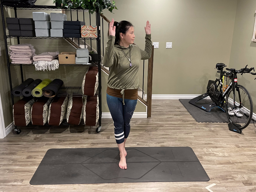 Jackie Lai demonstrates the Egyptian Balance pose.