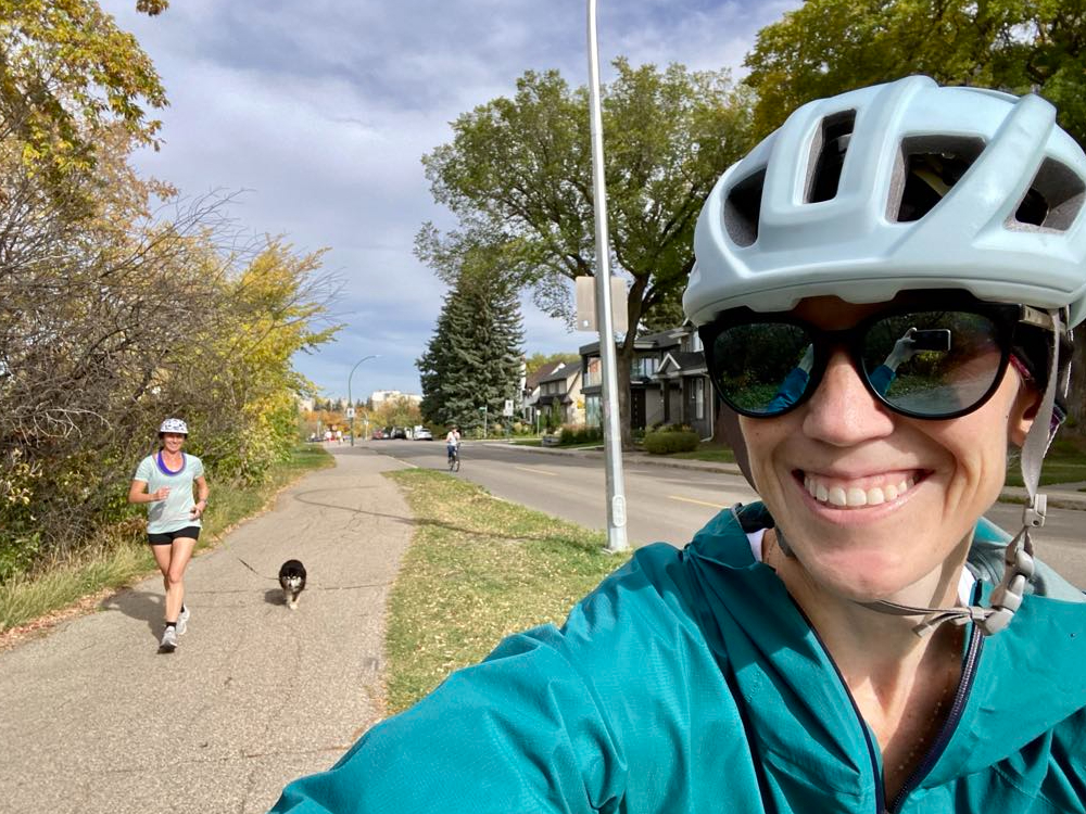 Lisa Currey (right, on bike) leads the way on one of Mandy Currie's runs.